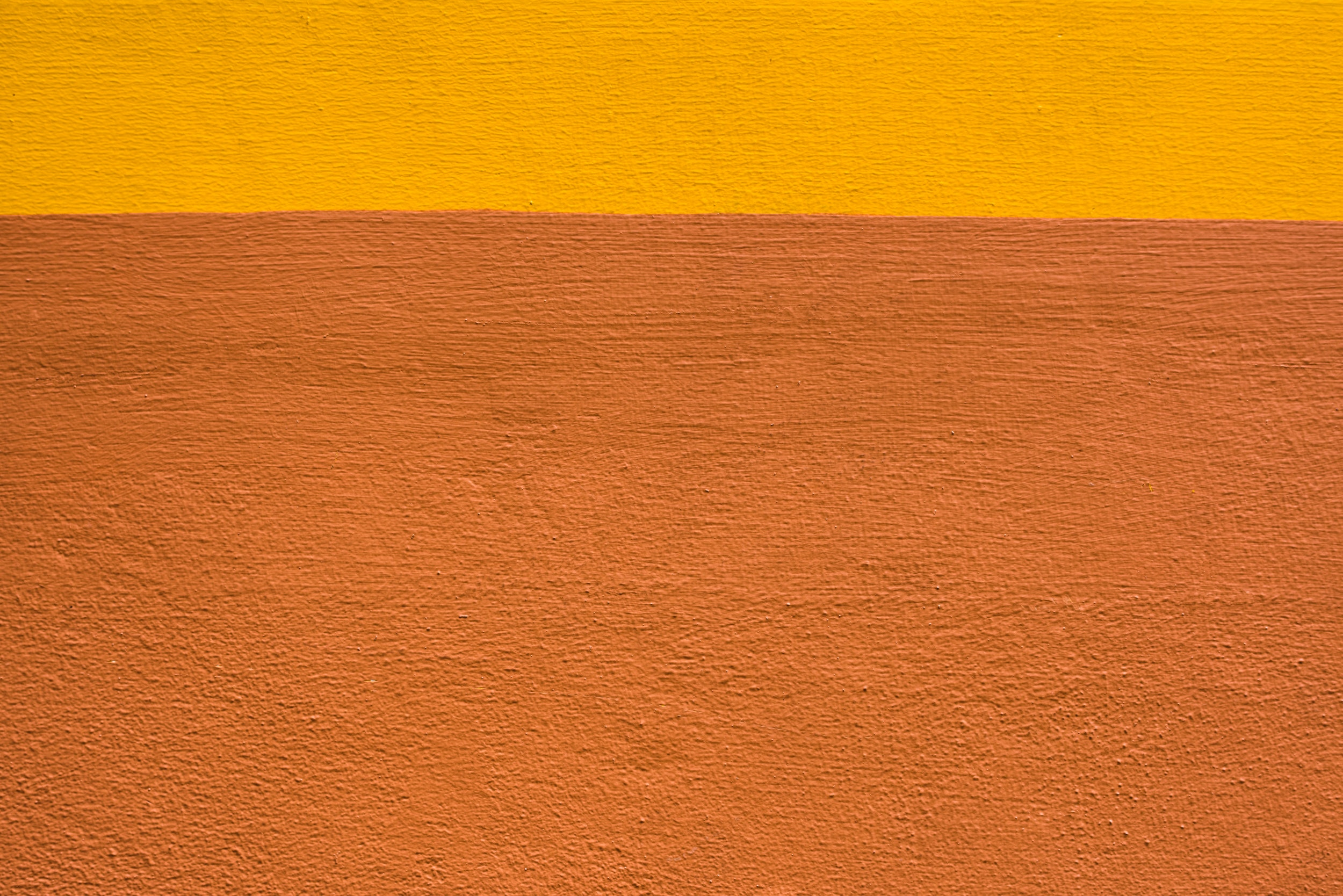 Большой коричневый желтый. Желто-коричневый цвет. Желтокоричнеквый фон. Текстура оранжевого бетона. Желтая поверхность.